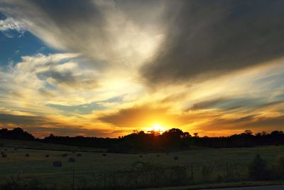 Scenic view of landscape at sunset