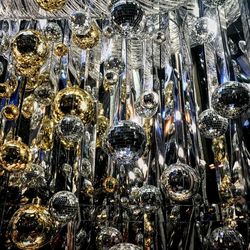 Full frame shot of glass decoration hanging at store