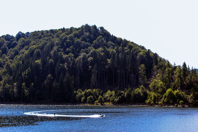 Scenic view of lake against clear sky