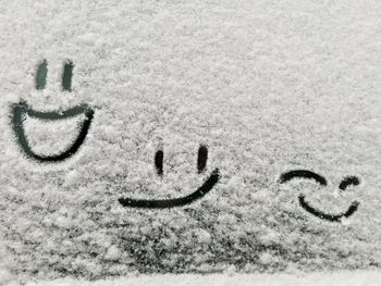 Text written on snow covered land