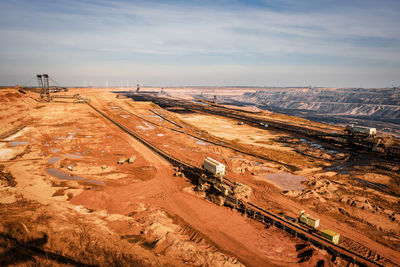 Panoramic view of garzweiler opencast mine with various excavators in use, germany.