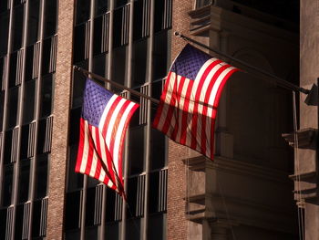 Low angle view of american flags on building