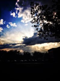 Silhouette of trees against sky at sunset