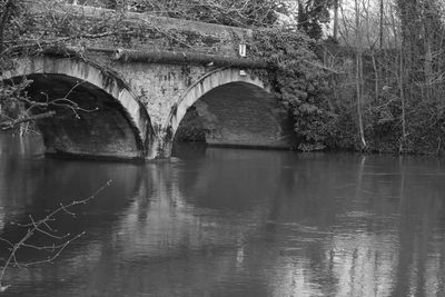 Arch bridge over river