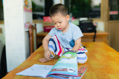 Close-up of boy at home