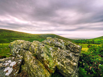 Scenic view of rocks against sky