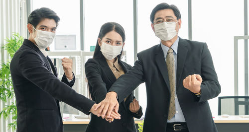 People standing in front of office