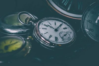 Close-up of clock on table