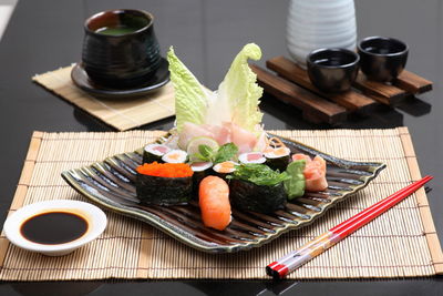 Sushi in plate on table