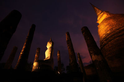 Low angle view of temple against sky at night