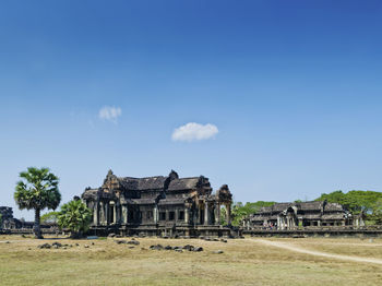 Old temple building against sky