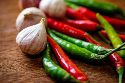 Close-up of chili peppers on table