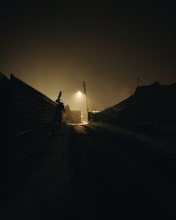 Windmill in winter at night