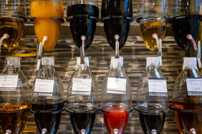 Close-up of wine glasses on table