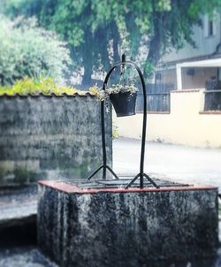 Close-up of built structure against trees