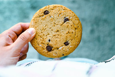 Close-up of hand holding cookies