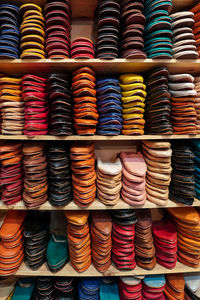 Full frame shot of colorful shoes in rack for sale