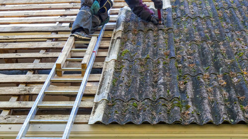 Low section of man working at construction site