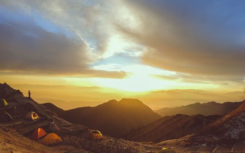 Scenic view of mountains against sky during sunset