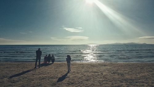 Scenic view of sea against sky at sunrise