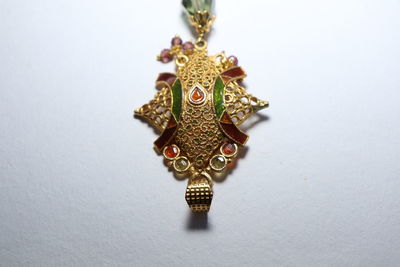 Close-up of decoration on wall against white background