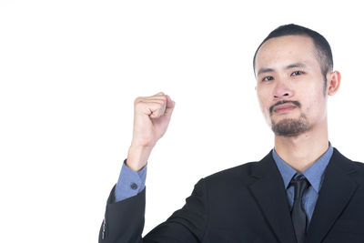 Portrait of man against white background