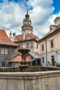 Low angle view of buildings against sky in city