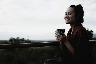 Series photo of young woman hand holding ceramic mug, positive emotion, chill and joyful