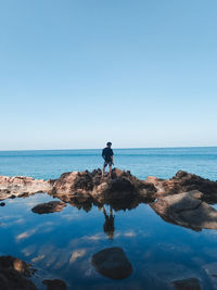 Scenic view of sea against clear sky