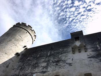 Low angle view of old building against sky