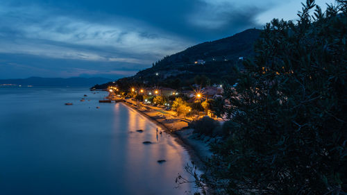 Scenic view of sea against sky at night