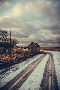 Road against cloudy sky