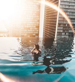 Woman swimming in pool