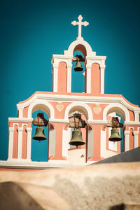 Low angle view of building against clear blue sky