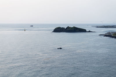 Scenic view of sea and clear sky