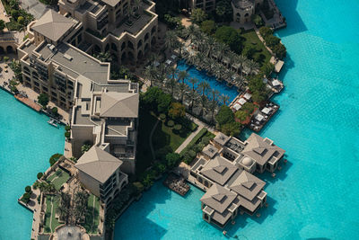 High angle view of swimming pool by building