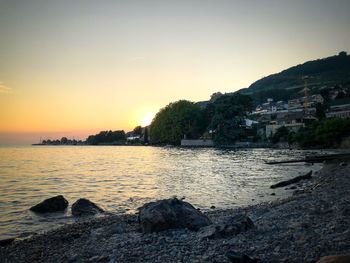 Scenic view of sea against sky during sunset