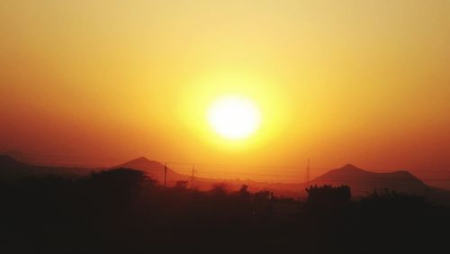 Scenic view of landscape at sunset