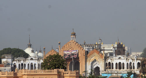 Facade of temple against clear sky
