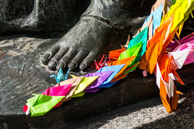 Low angle view of multi colored flags