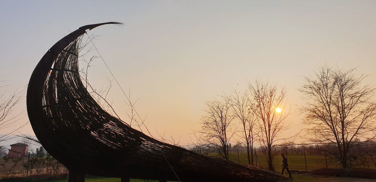 sky, sunset, no people, nature, tree, beauty in nature, scenics - nature, orange color, plant, bare tree, wood - material, outdoors, tranquility, sun, land, tranquil scene, metal, water, protection