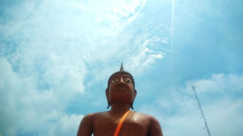Low angle view of statue against sky