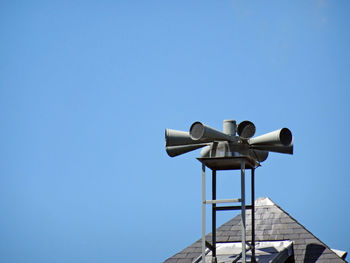 360 degrees siren with a blue sky background close-up. 