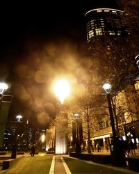 Illuminated street at night