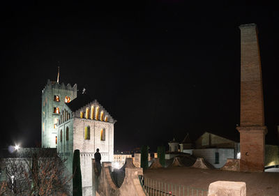 Old building against sky at night