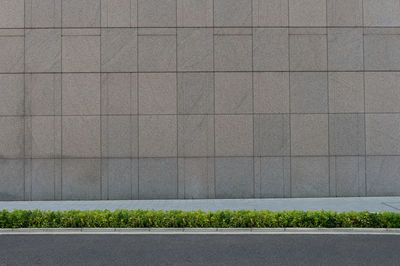 View of street against wall