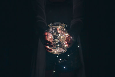 Close-up of hand holding glass