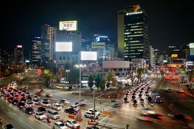 High angle view of traffic on city street at night