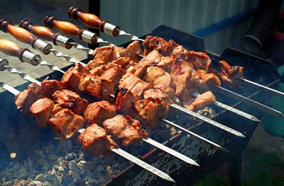 Wonderful delicious kebabs are fried on the grill.
