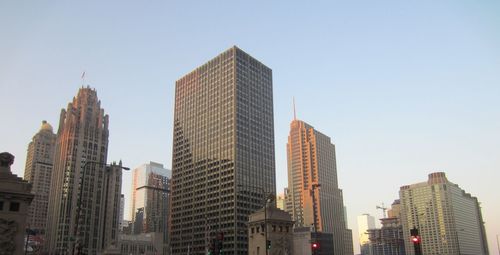 Low angle view of buildings against clear sky